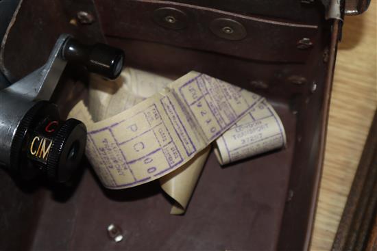 A Gibson A14 London bus ticket machine and a Swedish AB Almex ticket machine, both in fitted leather cases